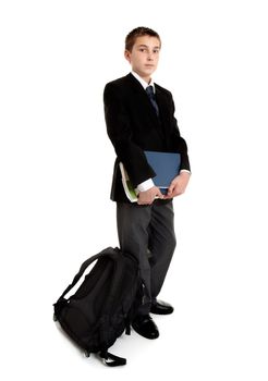 Standing school student with school bag and text books.
