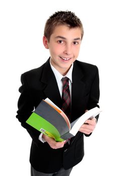 A student looking up from a text book and smiling