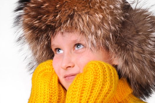Young happy boy wearing winter clothing