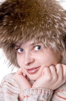 Beautiful pretty woman smilling wearing in fur hat
