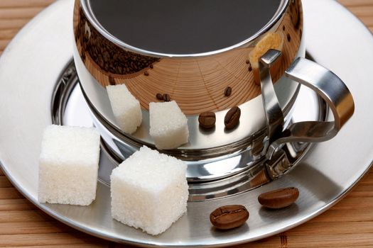 Cup of coffee with lump sugar, coffee series