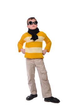 boy clad in yellow sweater and spectacles of the pilot on white background