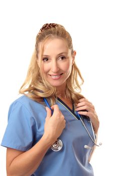Friendly female nurse in scrub uniform holding her  stethoscope.