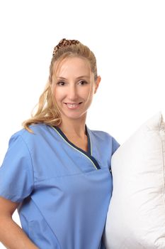 Smiling nurse wearing a  blue scrub uniform