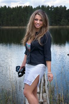  Portrait of young sexual girl on lake background