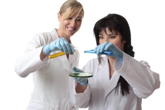 Two women in a lab conduct laboratory research