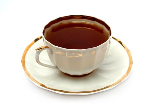 Cup of black tea on a plate, (look similar images in my portfolio)