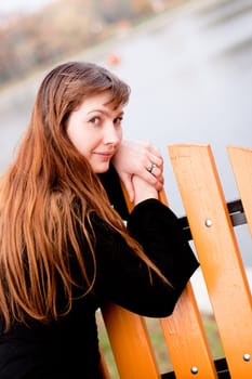 Portrait of  lady in black dress in the park
