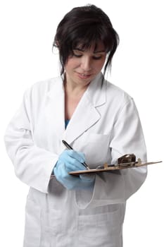 Doctor, scientist or other healthcare worker writing on document on a clipboard