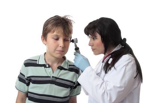 A doctor uses an otoscope to examine a child's ear.