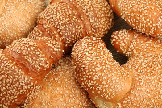 Fresh sweet rolls with sesame, background