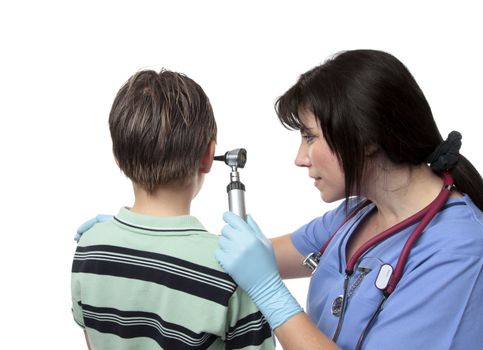 Female doctor in scrubs uniform checking a patient with ear problems