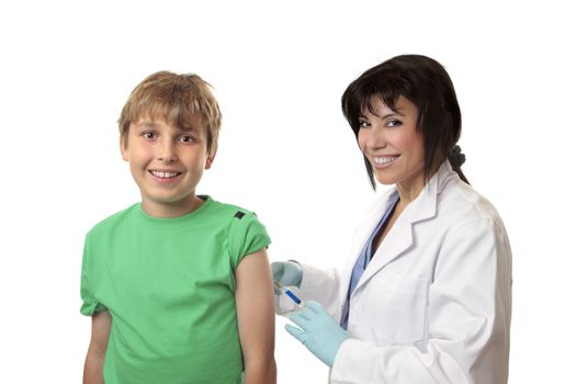 Brave happy boy receives an injection or vaccination from a friendly doctor.