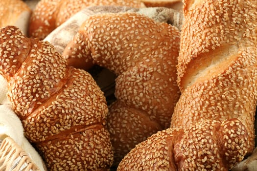 Fresh sweet rolls with sesame, background