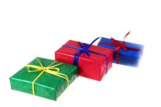 some colored gift boxes on white background