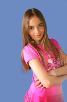 young girl in pink on blue background