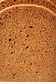 Cut of a rye bread, background