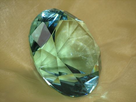 Glass cut in form of a gemstone