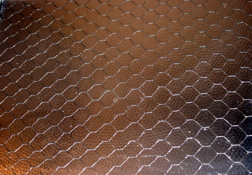 a window panel of safety glass with embedded wire