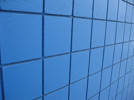blue painted walls of building - background