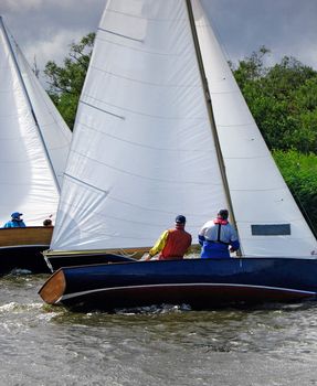 Sail boats racing on the Norfolk Broads
