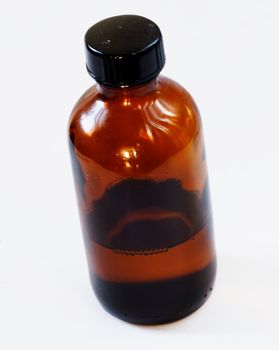 isolated shot of a brown bottle on white