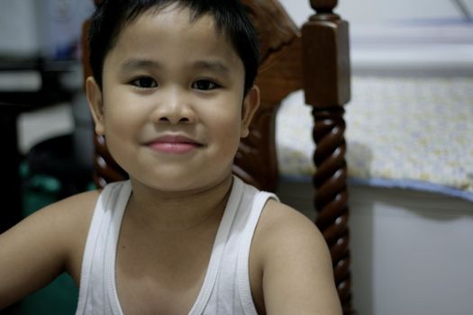 Young Asian Child Adorable Brown Face with charming smile