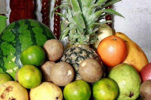 Tropical fruits stacked for the new year celebration - beautiful colors