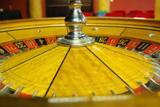 An old Roulette wheel with a silver center