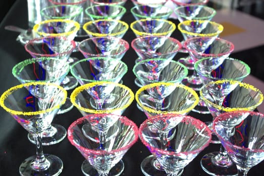 Colorful green, red and yellow Martini cocktail glasses