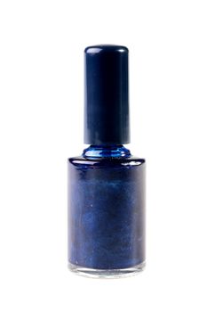 The small bottle with dark blue nail polish, is used in the course of manicure.