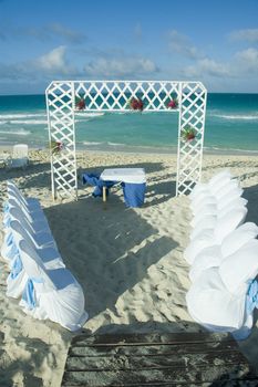 wedding arrangement on a sandy tropical beach