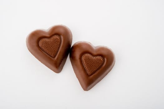 Image of two heart shaped chocolate candies