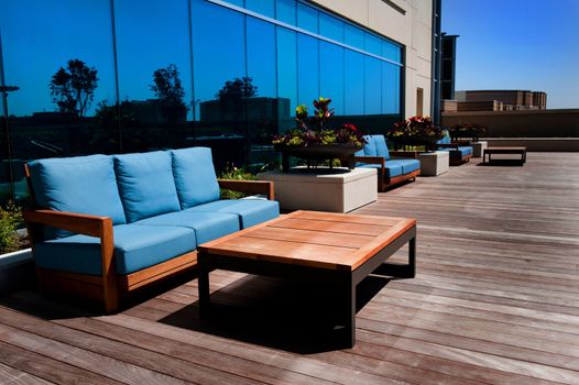 Image of modern outdoor furniture on wooden deck