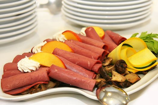 Ham rolls and mushroom closeup