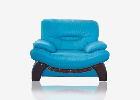 Stylish leather sofa of turquoise color with wooden legs