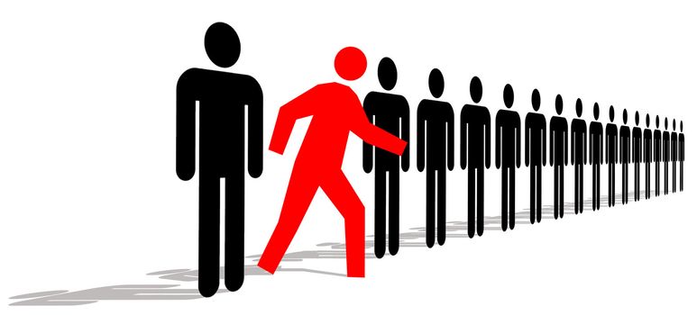 Red Man Standing Out In A Line Of Black Men