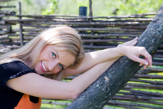 Portrait of the girl having a rest in the summer in park