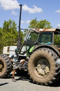 Old tractor ready to be mounted by the farmer in the bush in Australia.