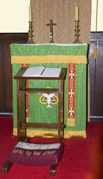 Small side altar with chair to kneel in a Christian church in Albany, Australia.