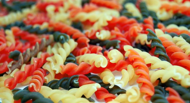 colored pasta or colored noodles redy for cooking