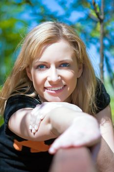 Portrait of the girl having a rest in the summer in park