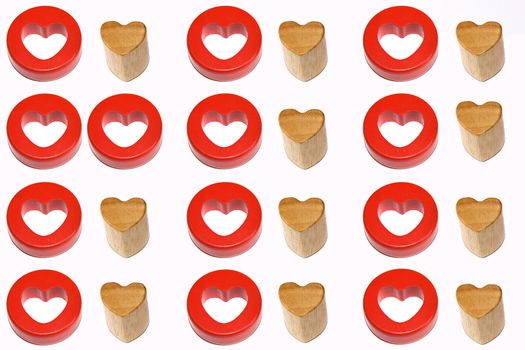 Two red hearts on an image with red and wooden couples