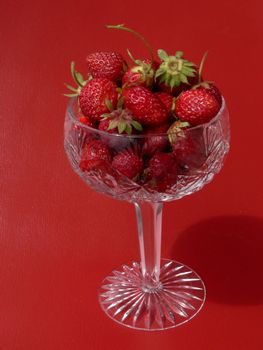 Strawberries in crystal tall wine glass 3