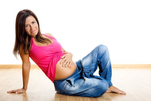 Beautiful and happy pregnant woman isolated oin white