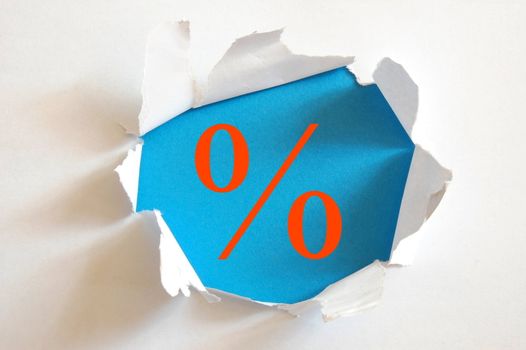 sale concept with hole in blank paper