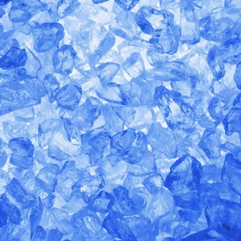 square ice cubes background in blue for summer drinks