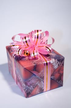 Beautiful gift box with a bow on a white background