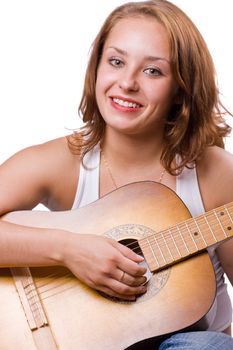 Beautiful girl playing guitar. Isolated on white. #4