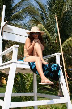 Sexy model on lifeguard tower